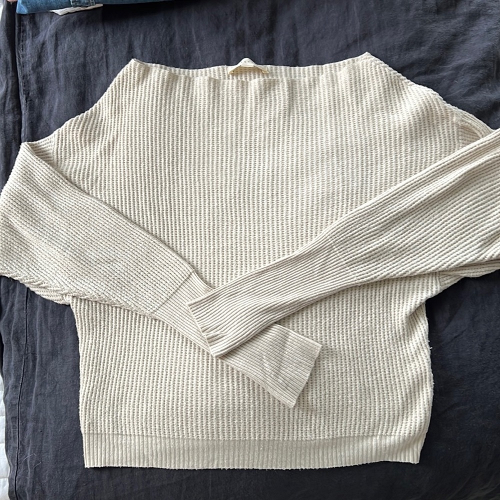 Light weight cream sweater. Size medium.